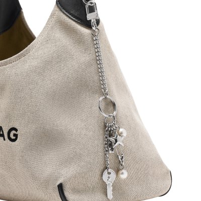 THE GROMMET BAG CHARM
